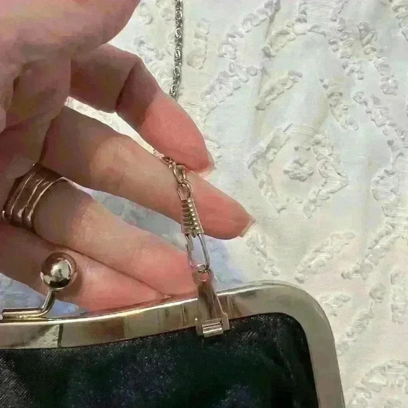 Purse perfect for a wedding or‎ date night. Black with silver accents. - Picture 4 of 8